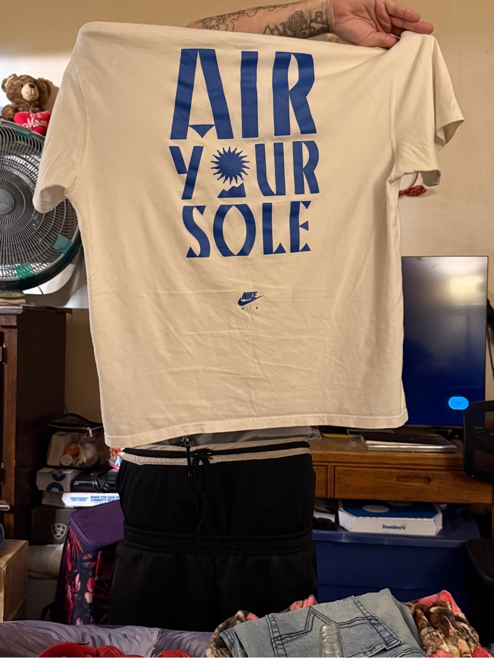 Nike Cream T-Shirt with Blue 'AIR YOUR SOLE' Graphic